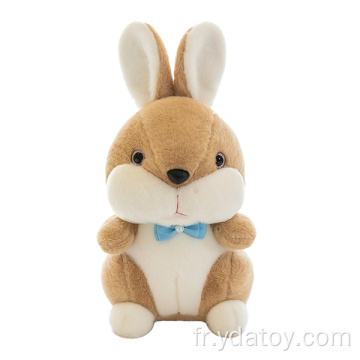 Petit oreiller de lapin brun en peluche